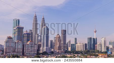 Kuala Lumpur Skyline, View Of The City, Skyscrapers With A Beautiful Sky In The Morning.