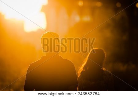 Moscow, Russia - June 25, 2016: Man And Woman Walking At Sunset In The Museon Art Park.