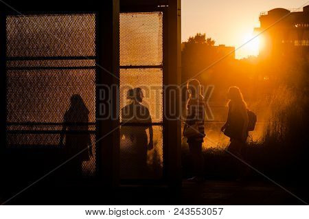 Moscow, Russia - June 25, 2016: Girls Walking At Sunset In The Museon Art Park.