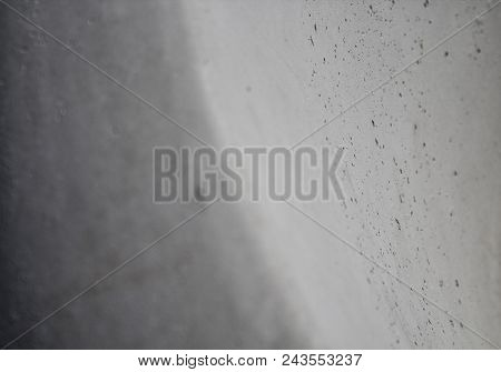 Abstract gray background. Gray background. Gray surface. Off-white. Grunge style. Gray grunge.