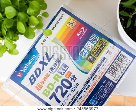 GOMEL, BELARUS - MAY 30, 2018: Mitsubishi (Verbatim) BD-R XL 100GB disc on a variocolor background. The Mitsubishi Group is a group of autonomous Japanese multinational companies.