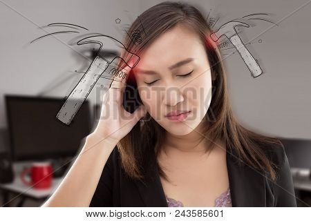 Stressed Exhausted Asian Woman Having Strong Tension Headache At Office. Thailand People Suffering F