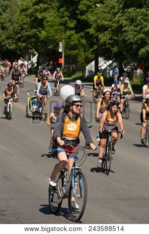 MONTREAL,CANADA- JUNE 3, 2018:  The Tour de l ile is a Sunday biking classic, where thousands of cyclists fill the streets of Montreal in Canada.  