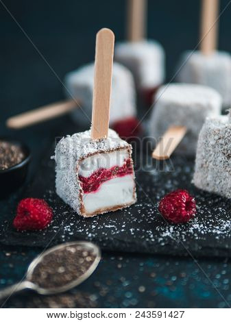 Homemade Raw Lamington Ice Cream Pops On Dark Background. Australian Sweet Dessert Lamington With Ch