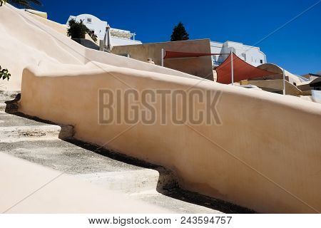 Typical Mediterranean Urban City And Sea Landscape Seen From A Terrace. Santorini Greece
