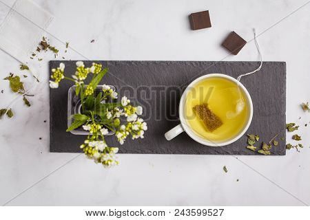 Green (herbal, White) Tea With Chocolate On White Background. Flat Lay Food, Breakfast Lifeslyle Con