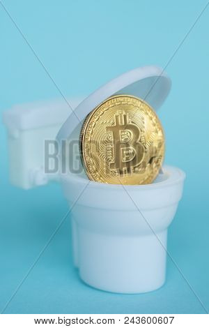 Bitcoin Is Poured Into The Toilet Bowl