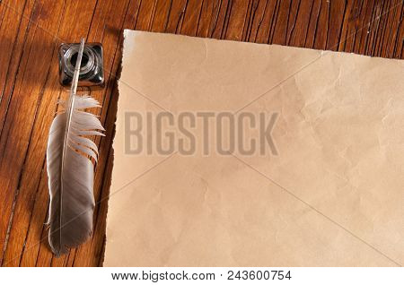 Quill Pen And Old Paper
