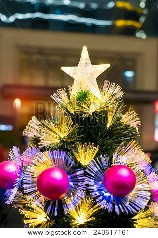 Details of a fiber-optic decorated Christmas Tree with dectoration