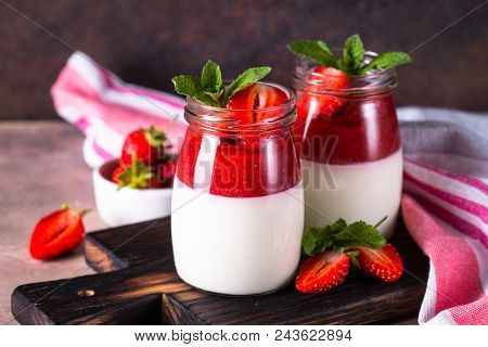 Panna Cotta With Strawberry Jam. Sweet Dessert From Whipped Cream With Strawberry Jam And Fresh Stra