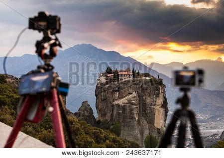 Professional Camera On Tripod Taking Picture Film Video From The Holy Trinity Monastery On Cliff At 