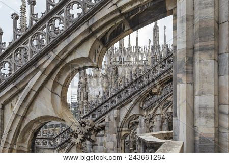 Milan, Italy - May 17, 2018: This Is A Kind Through The Counterforts On The Spiers Of The Milan Cath