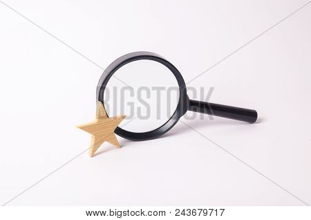 Magnifying Glass And Wooden Golden Star On A White Background. Find Information And Things, Special 