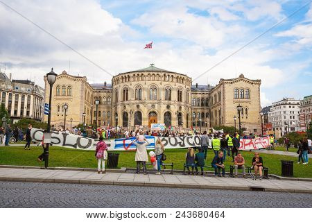 Oslo, Norway-august 13, 2014 -solidarity Activists Hold A Banner Reading 