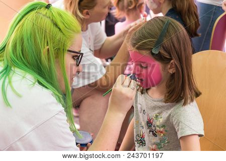 Bedford, Bedfordshire, Uk, June 2, 2018. Little Girl Getting Her Face Painted.