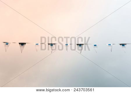 Bedford, Bedfordshire, Uk, June 2, 2018.triangular Flags On Sky Background.