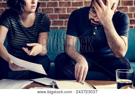 Couple managing the debt