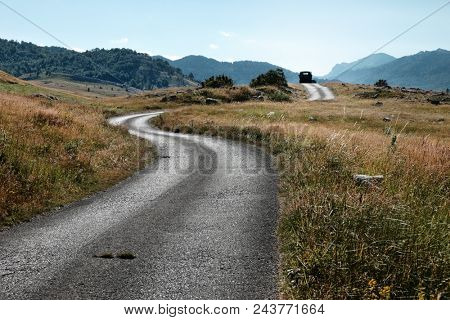 winding rural road in Lukavica Plateau, Montenegro 