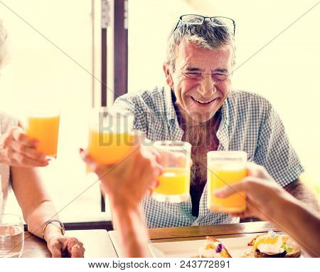 Senior man having breakfast