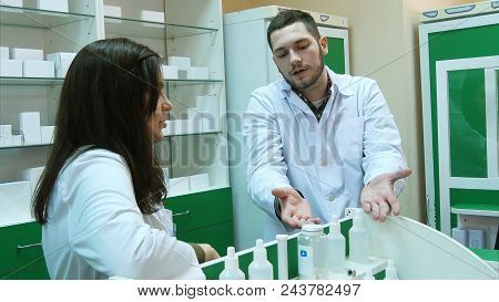 Dissapointed Team Of Apothecaries In Pharmacy Standing In Front Of