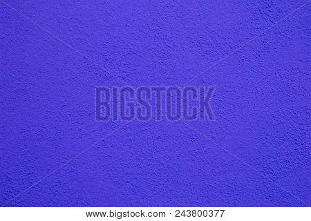 Purple Wall Background. Painted Rought Concrete Surface Texture
