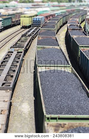 Rail Cars Loaded With Coal, A Train Transports Coal.