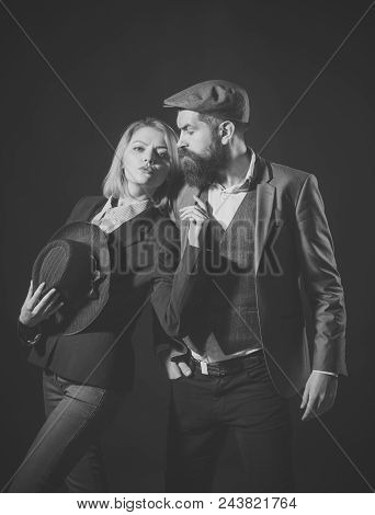Couple Of Detectives Or Researchers, Private Investigators. Man And Woman In Retro Suit And Hat On D