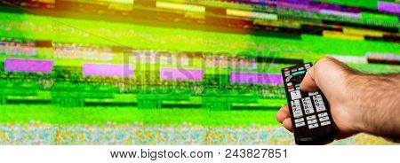 Man With Large Tv Remote Trying To Fix The Digital Television Noise On A Large Plasma Oled 4k Ultra 