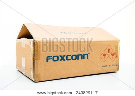 London, United Kingdom - Aug 23, 2018: Side View Of Foxconn Cardboard Delivery Box With Logotype On 