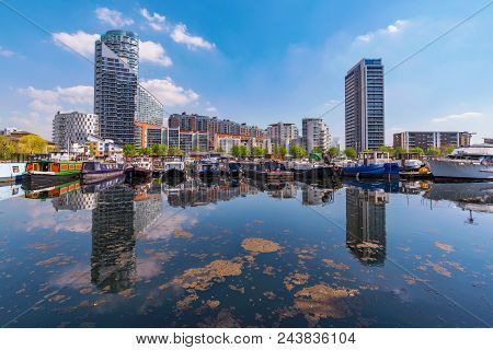 London, United Kingdom - April 20: Blackwall Basin Modern Riverside Apartment Buildings And Harbor A