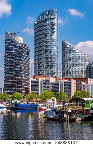 London, United Kingdom - April 20: Blackwall Basin Modern Riverside Apartment Buildings And Harbor A