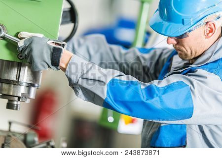 Lathe Metalworking Theme. Caucasian Lethe Machine Operator At Work.
