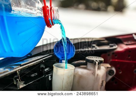 Detail On Pouring Antifreeze Liquid Screen Wash Into Dirty Car From Blue And Red Anti Freeze Water C