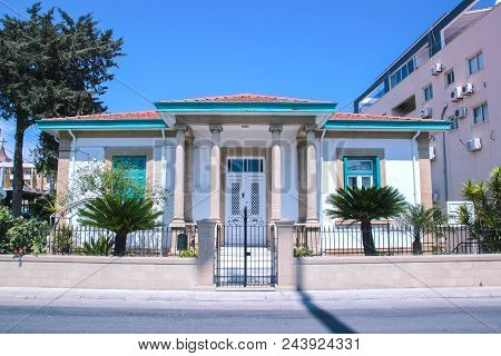 Detail Of Building In Cloudy Sky Landscape