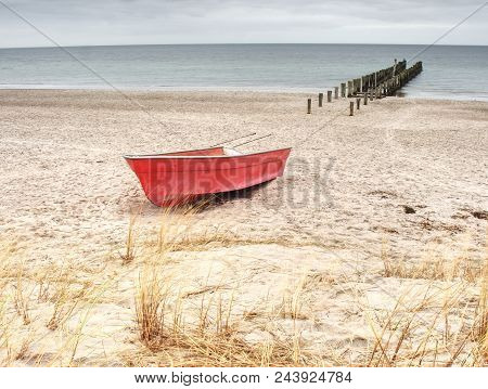 Fishermens Boat At Seacoast, On Sand At Sunset With Horizon Sea On Background. Background Of Sea Wit