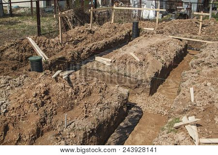 View Of Drainage Pipes And Inspection Well For Removal Of Water From A Site Under Construction Of Th