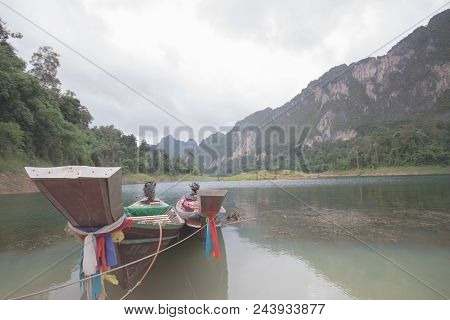 Another View Of The Close Up Of 2 Thai Boats On The Coast
