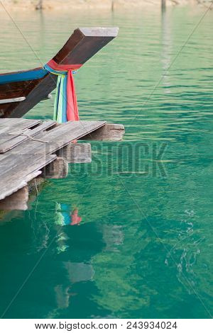 Close Up Thai Boat Along With Colorful Clothes