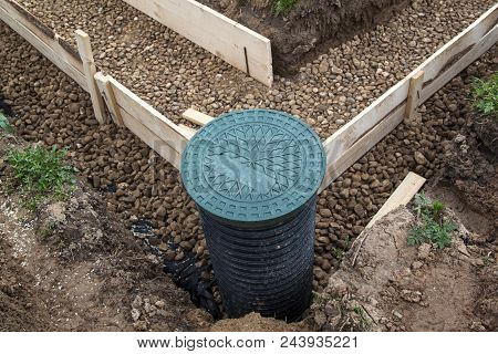Inspection Well, Drainage Pipe And Trench With Formwork, Which Is Prepared For Pouring The Foundatio