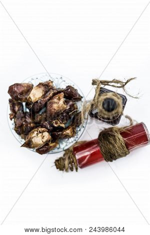 Sweet And Floral Essence Of Date Or Khajoor In Bottles Isolated On White Used In Flavored Chocolate 