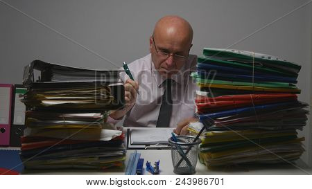 Businessman Working In Archive Office Room Looking In Financial Documents