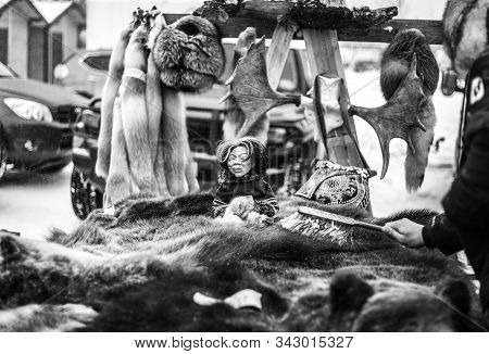 Kogalym, Khmao-ugra, Russia-03.31.2018:skins Of Bears And Foxes In The Market, Black And White Photo