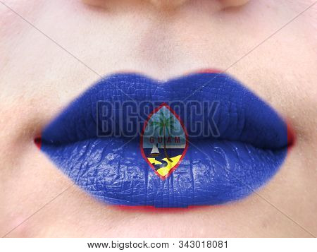 Female Lips Close Up With A Picture Flag Of Guam. Learning Languages.