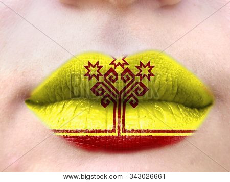 Female Lips Close Up With A Picture Flag Of Chuvashia. Learning Languages.