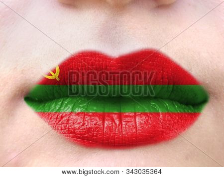 Female Lips Close Up With A Picture Flag Of Transnistria. Learning Languages.