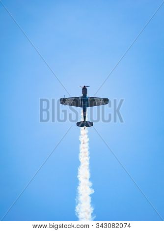 Bucharest/ Romania - Aeronautic Show - September 21, 2019: Yak 52Tw Airplanes Flying Trough The Sky