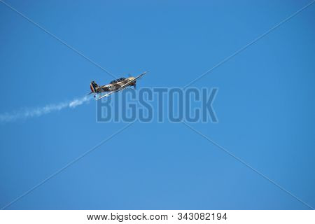 Bucharest/ Romania - Aeronautic Show - September 21, 2019: Yak 52Tw Airplanes Flying Trough The Sky