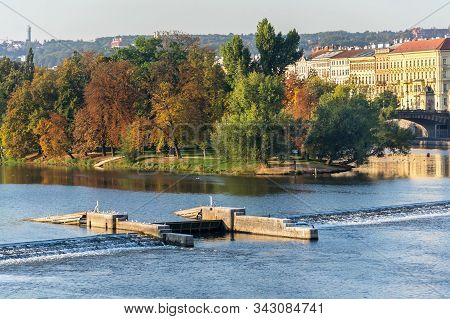 Strelecky Island With Weir On Vltava River Near National Theatre And The Charles Bridge, Prague, Cze