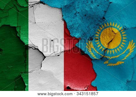 Flags Of Italy And Kazakhstan Painted On Cracked Wall