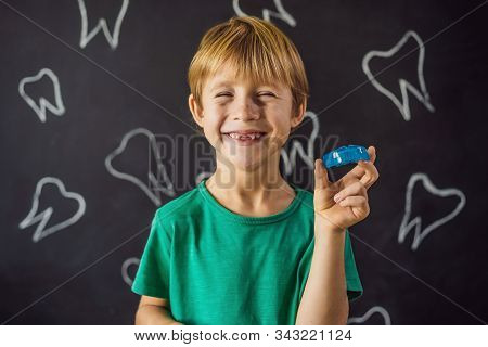 Six-year Old Boy Shows Myofunctional Trainer. Helps Equalize The Growing Teeth And Correct Bite, Dev